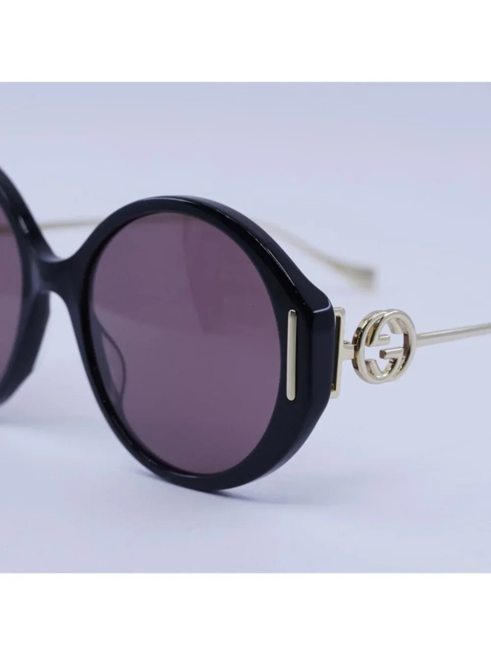 Gucci GG1202S 001 Sunglasses Black Round Frame, Brown Lenses